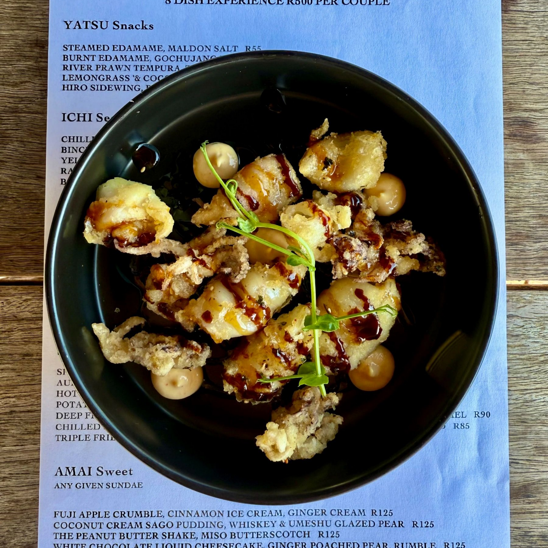 Chilli salt Patagonian squid with crispy wakame and soy sake reduction at Hiro Izakaya