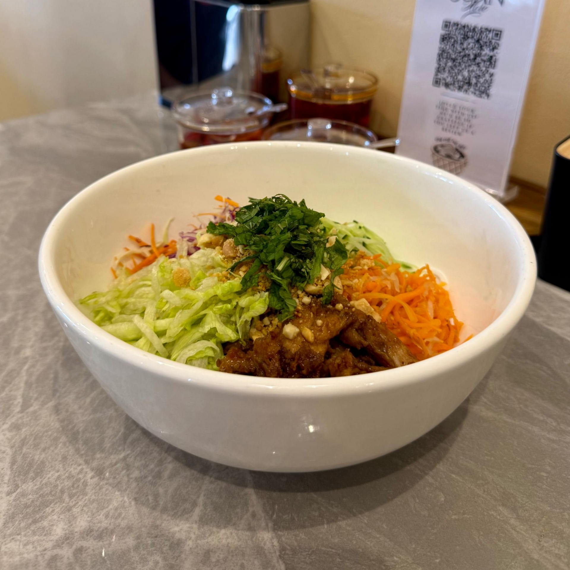 Chicken vermicelli bowl with vegetables and peanuts
