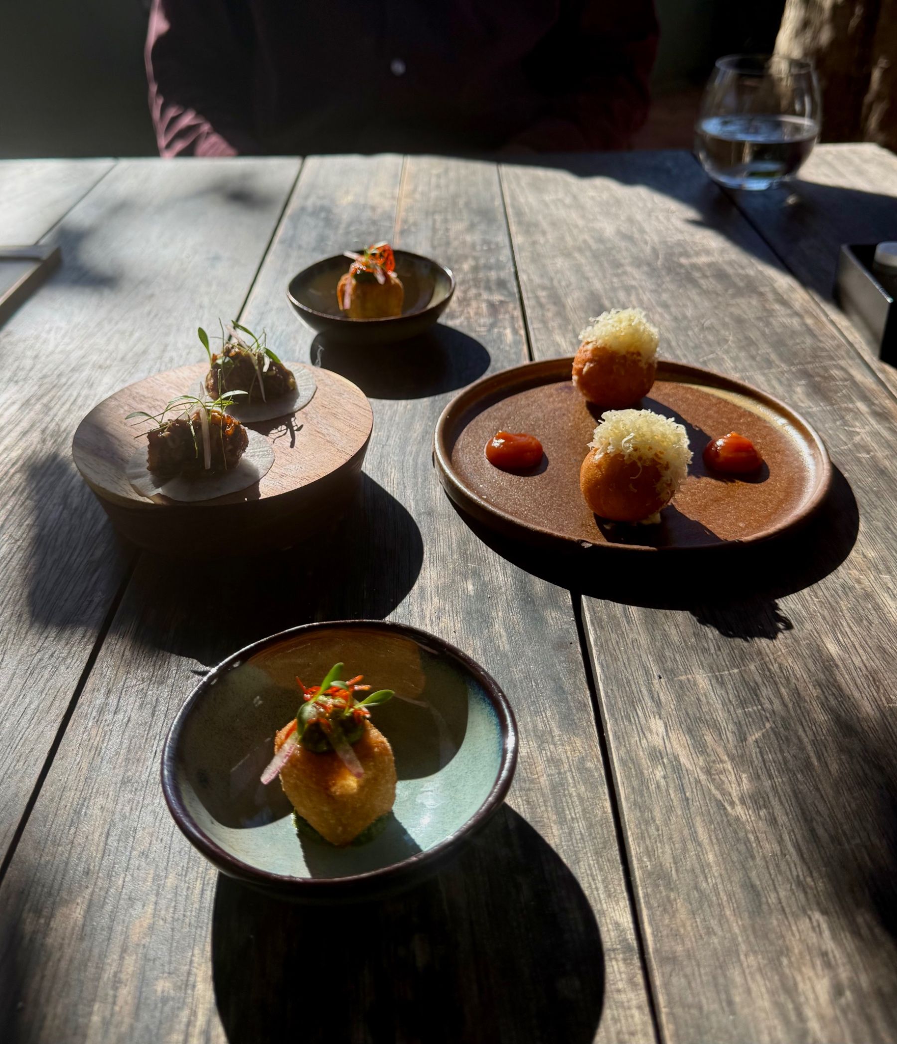 Amuse-bouche trio at Foxcroft Constantia including duck croquette, aubergine taco