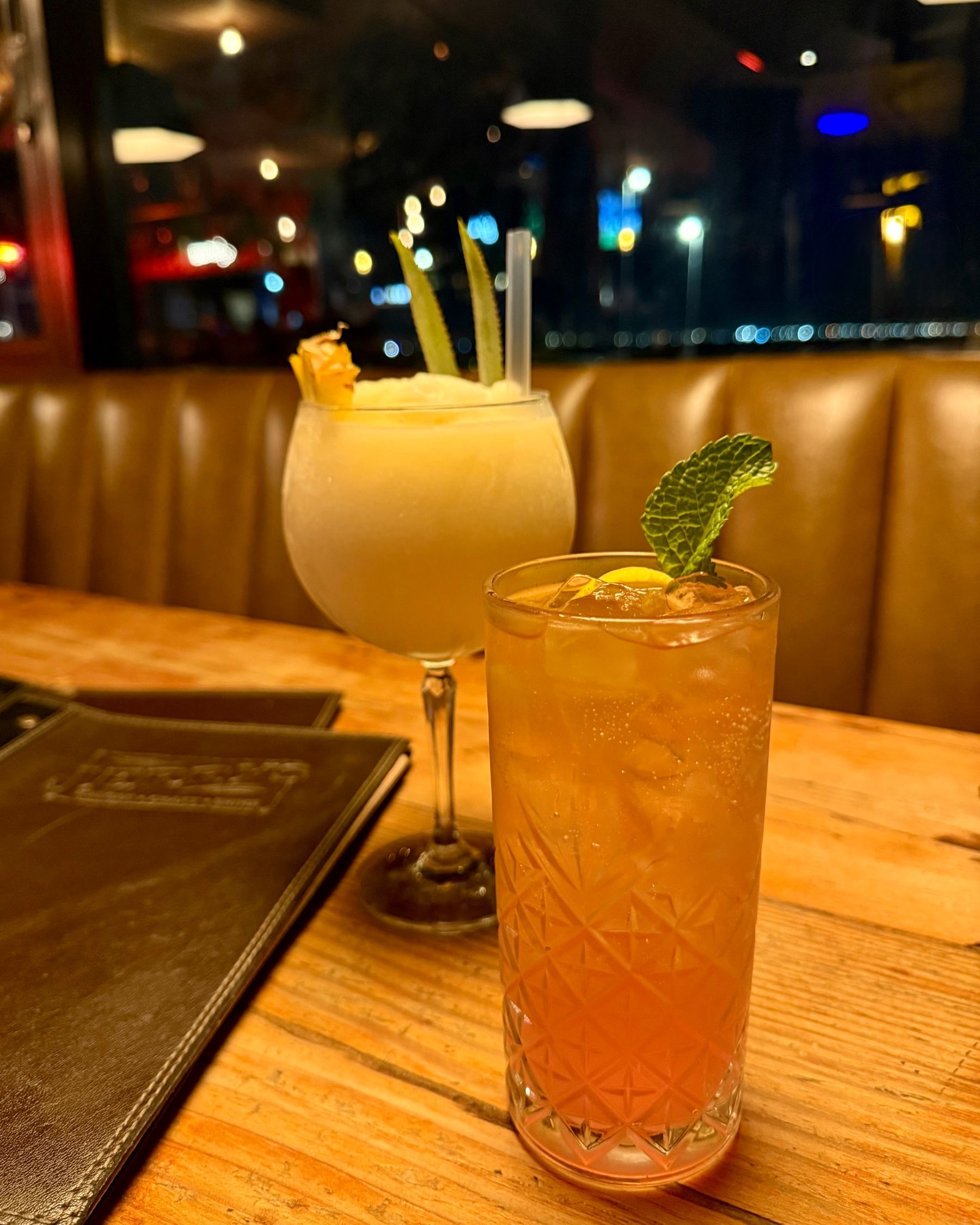 Watermelon Paloma and piña colada cocktails at Jerry’s
