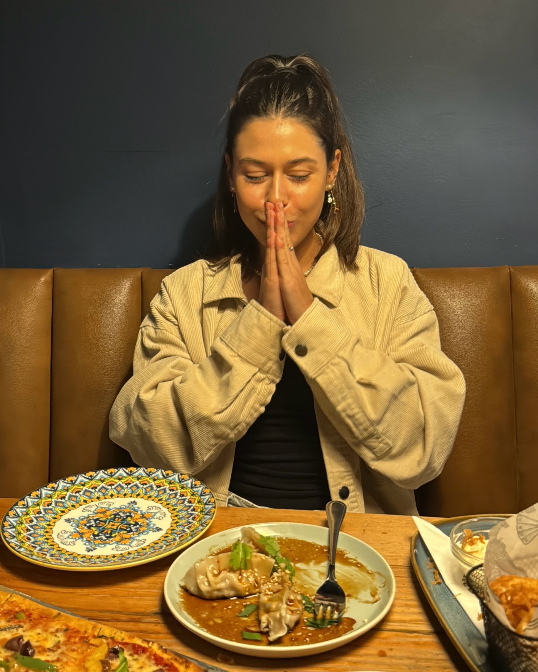 Paige eating dumplings at Jerry’s
