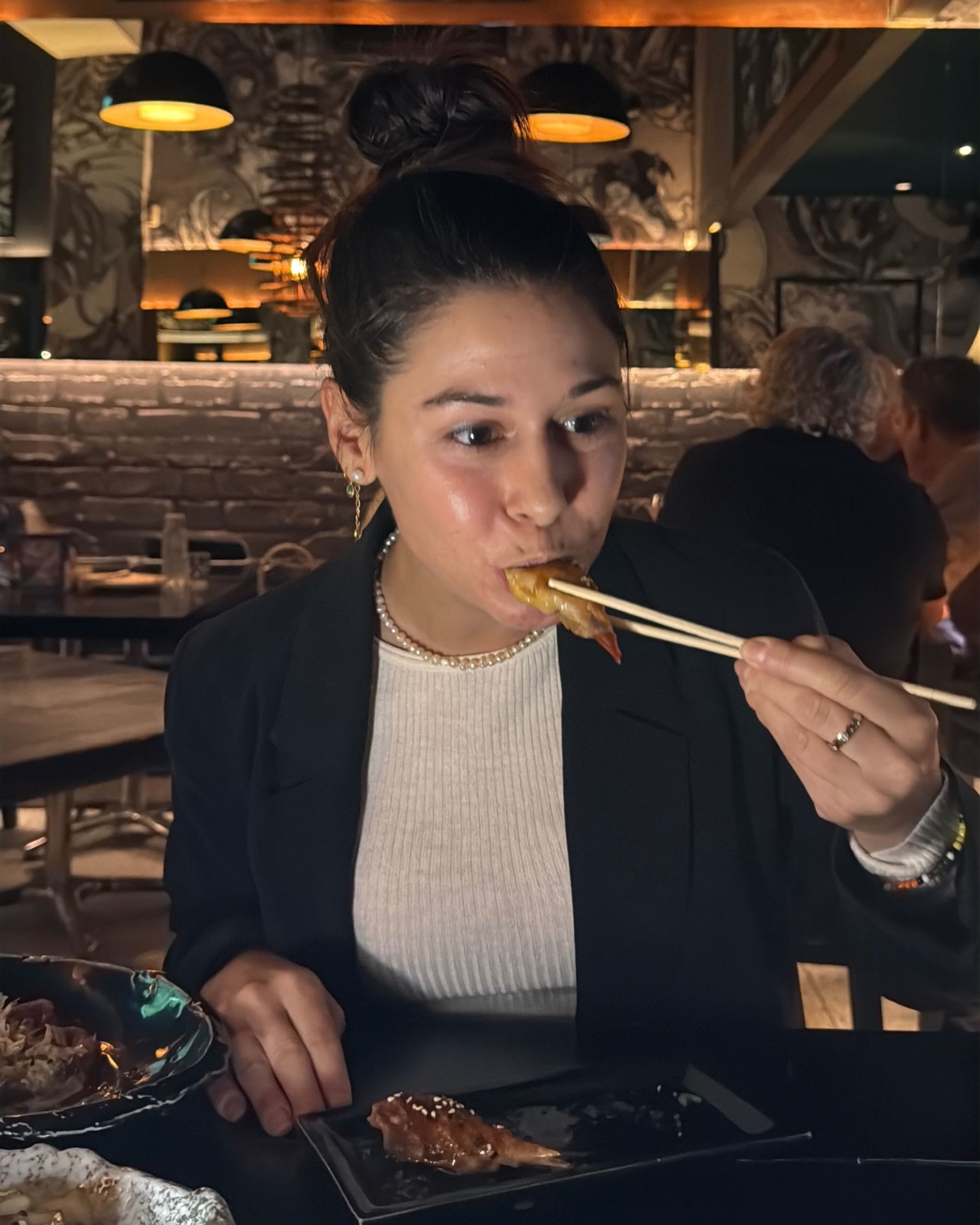Paige is eating prawn gyoza at Kanji Ramen