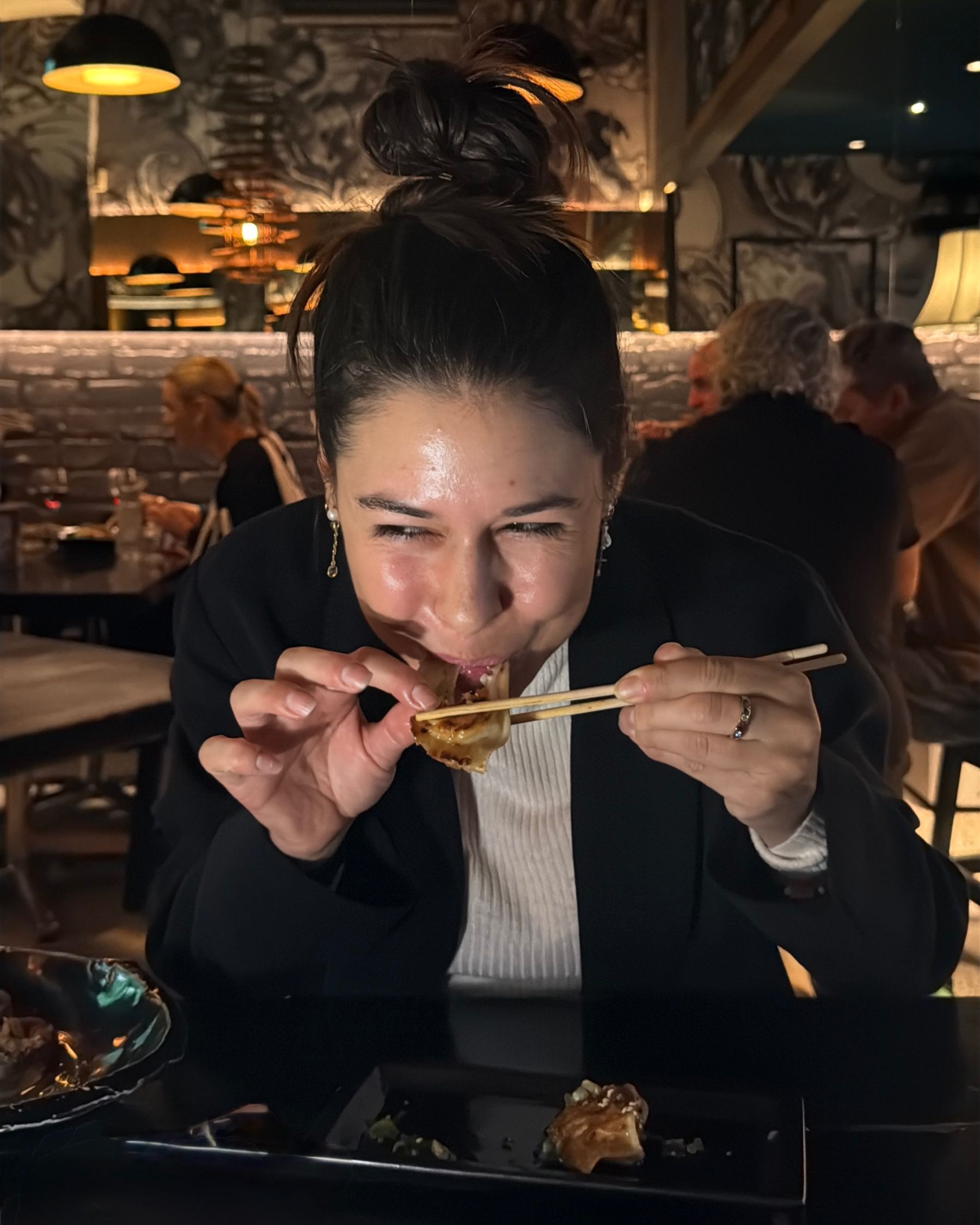 Paige is eating prawn gyoza at Kanji Ramen