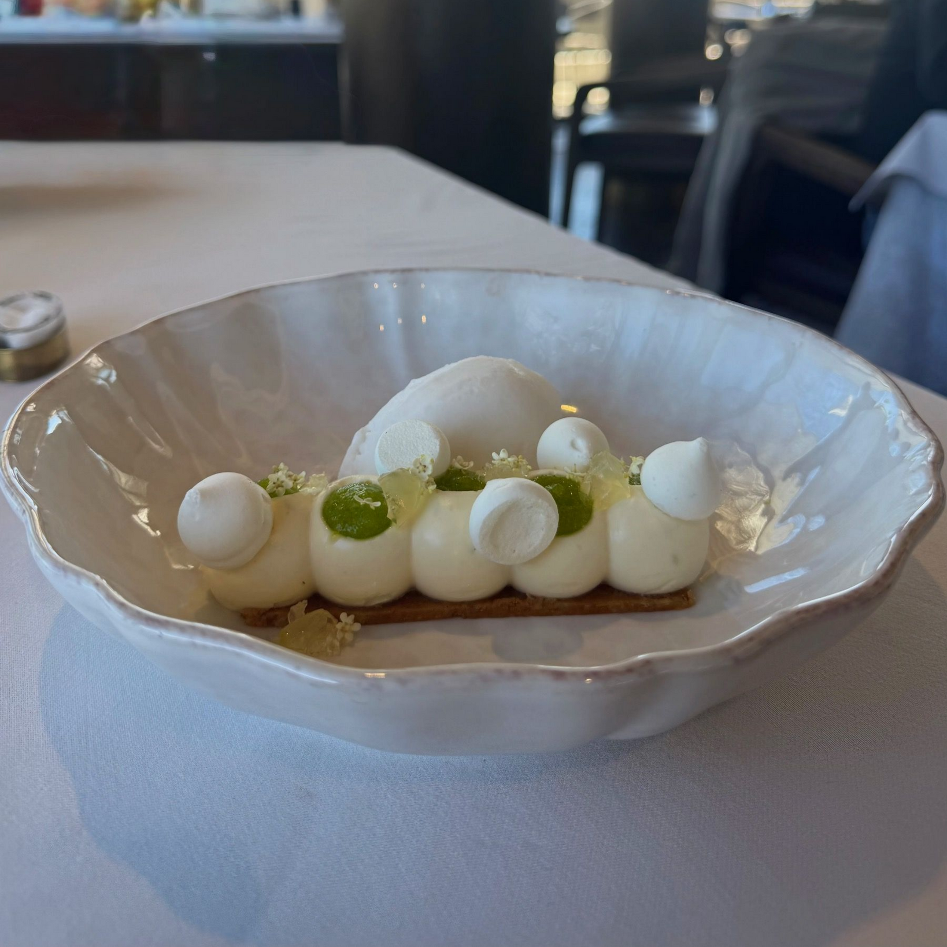 Modern key lime pie with lime jelly and meringue pearls at Marble Cape Town