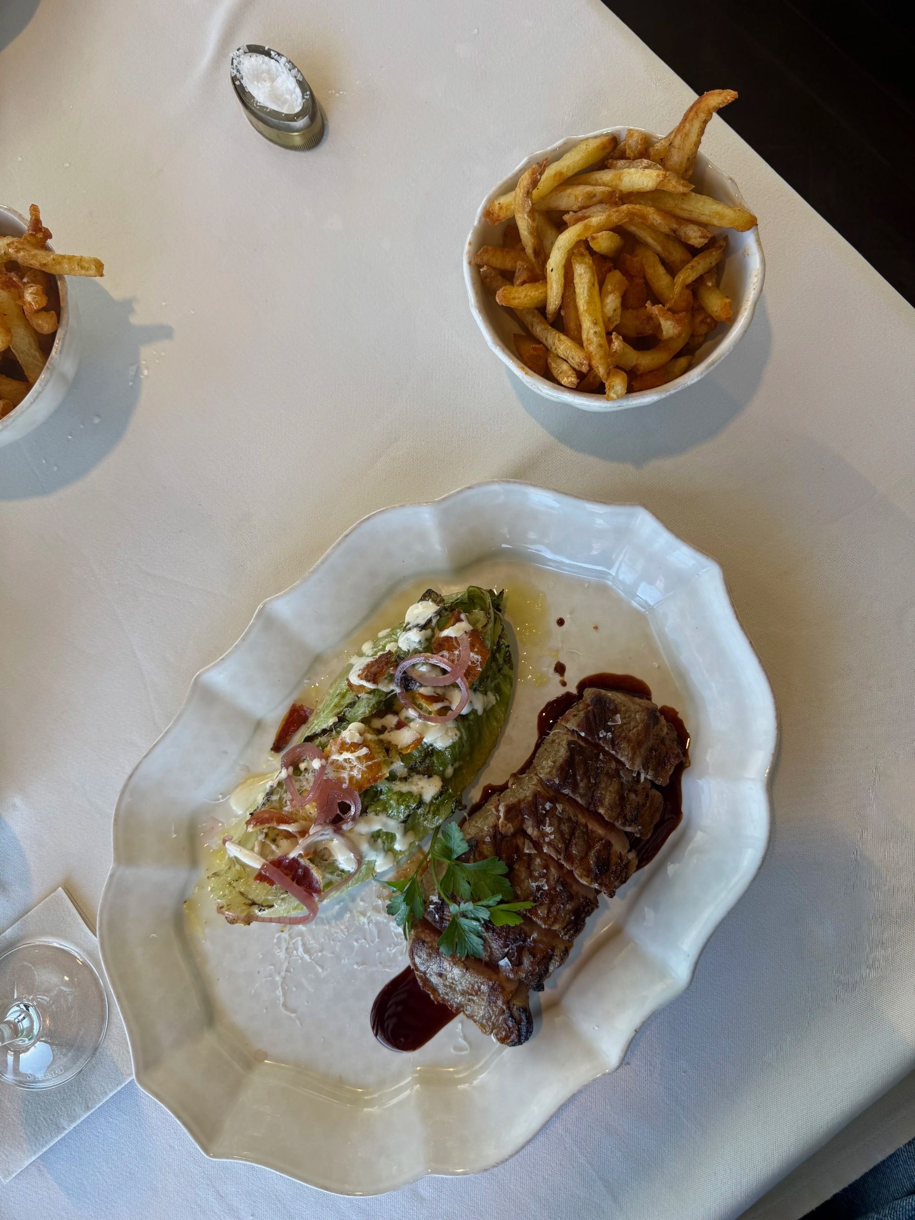 Sirloin steak with Caesar wedge and crispy paprika fries at Marble Cape Town