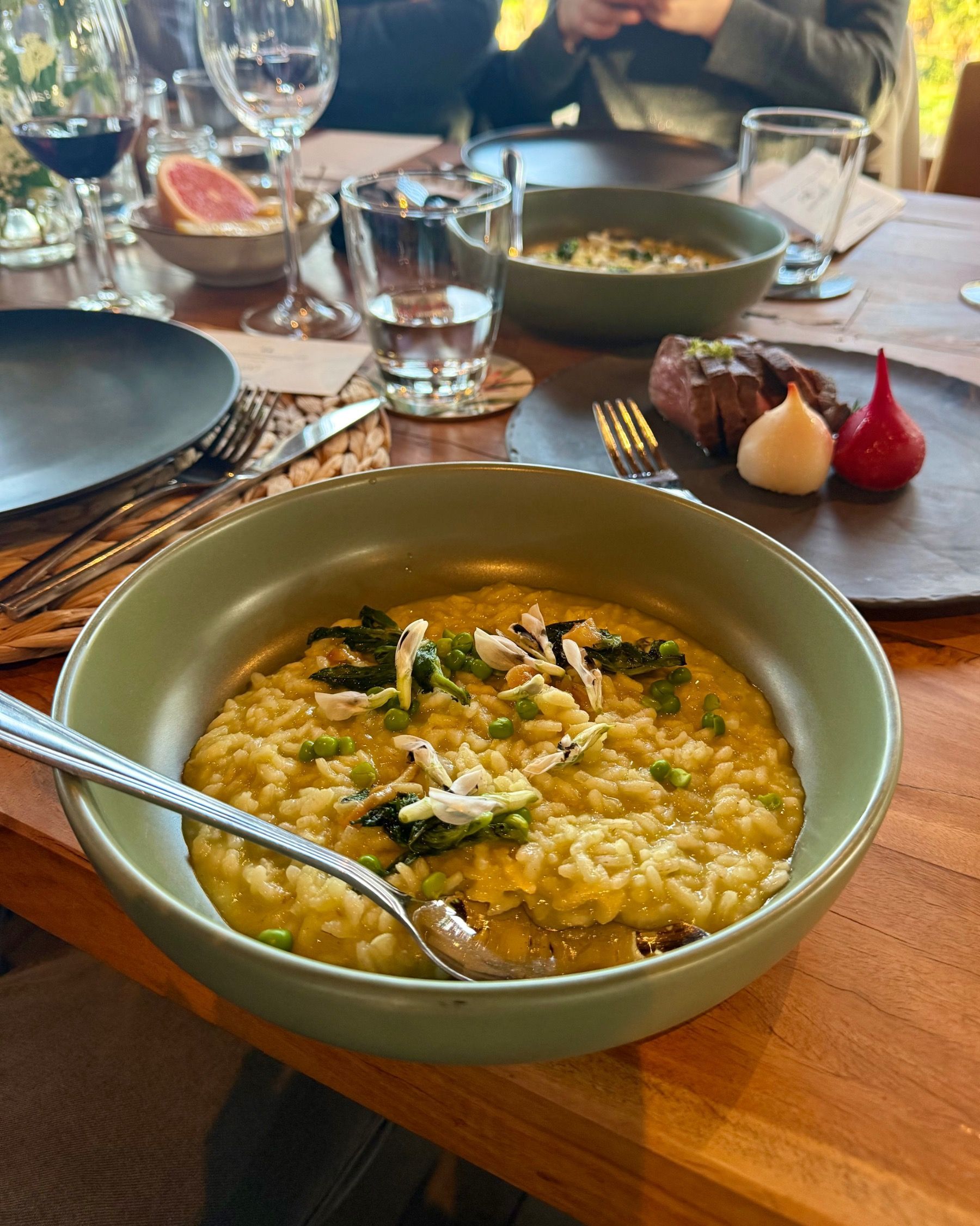 Creamy pea risotto with Karoo crumble and root vegetables served alongside smoked ostrich at Meuse Farm wine dinner