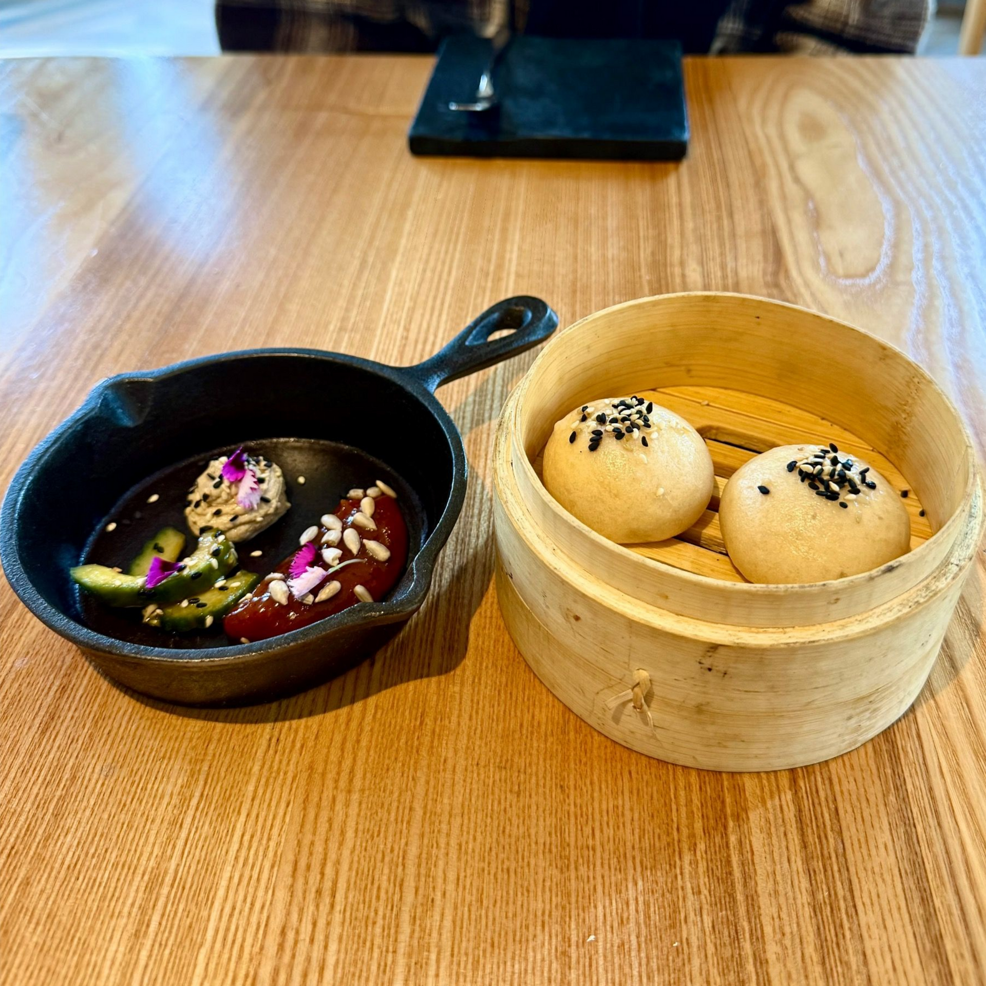 Steamed milk bread with cultured butter and Japanese condiments at Oku.