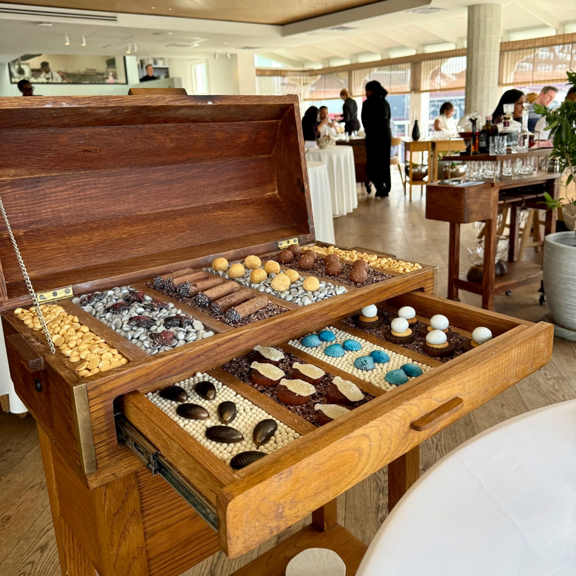 Petit four chest presentation at Pier Restaurant Cape Town