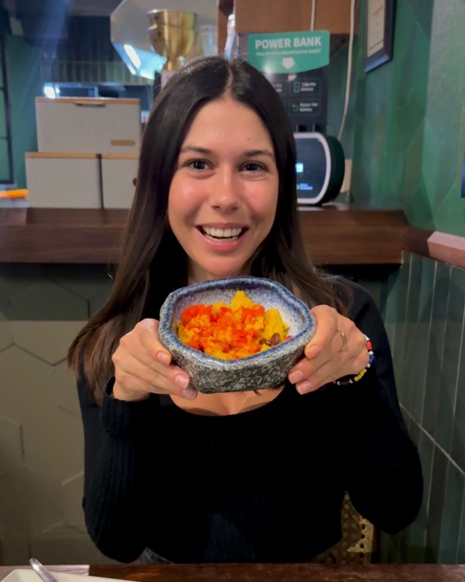 Paige is holding soji dessert at Sundoo Sea Point
