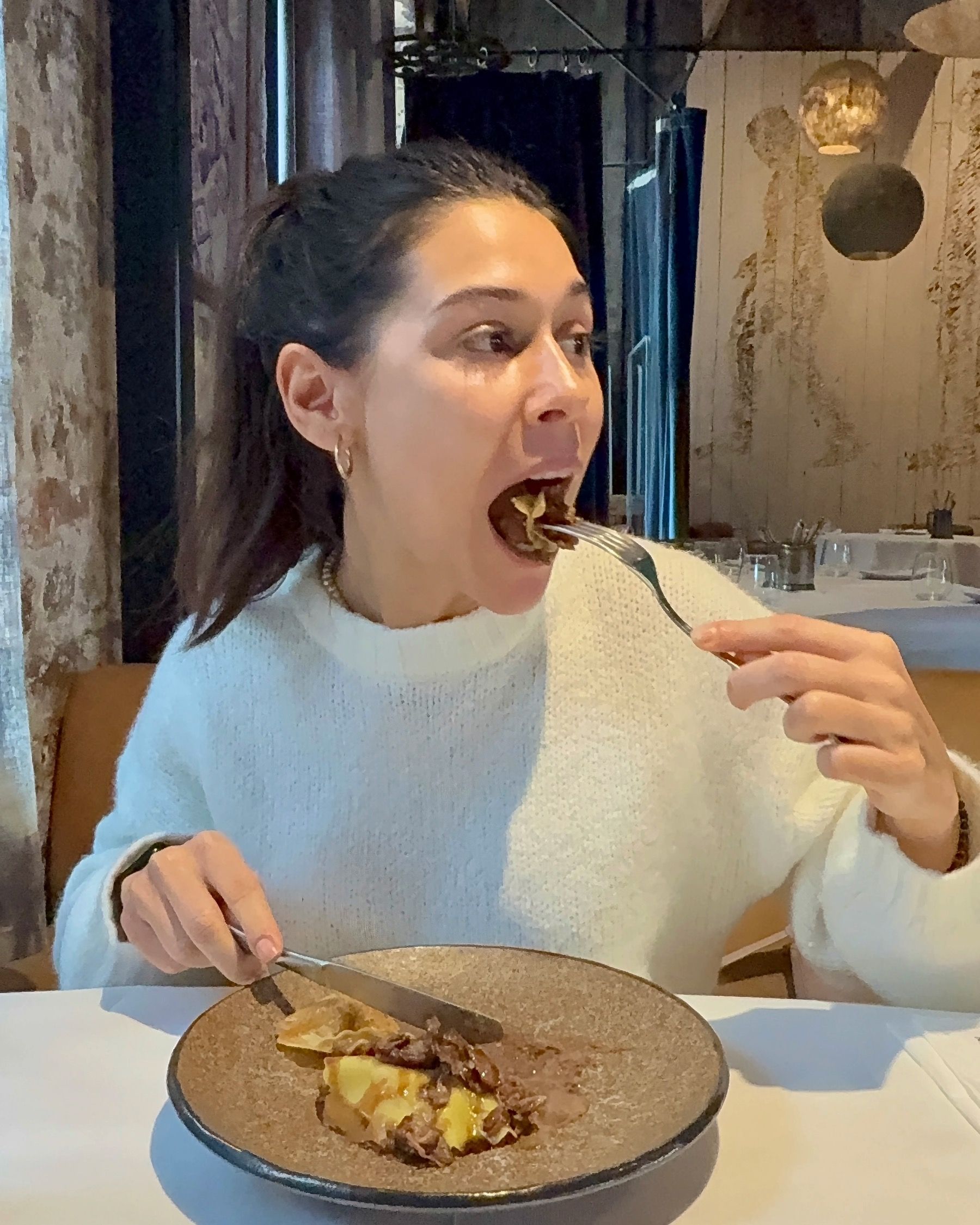 Paige enjoying layered oxtail pasta at The Test Kitchen Cape Town