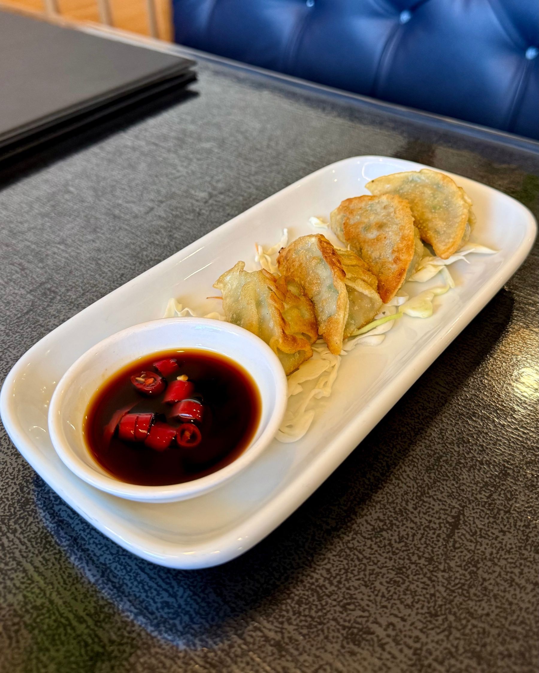 Crispy pork wontons with chilli soy dipping sauce at Vietnamese Street Kitchen
