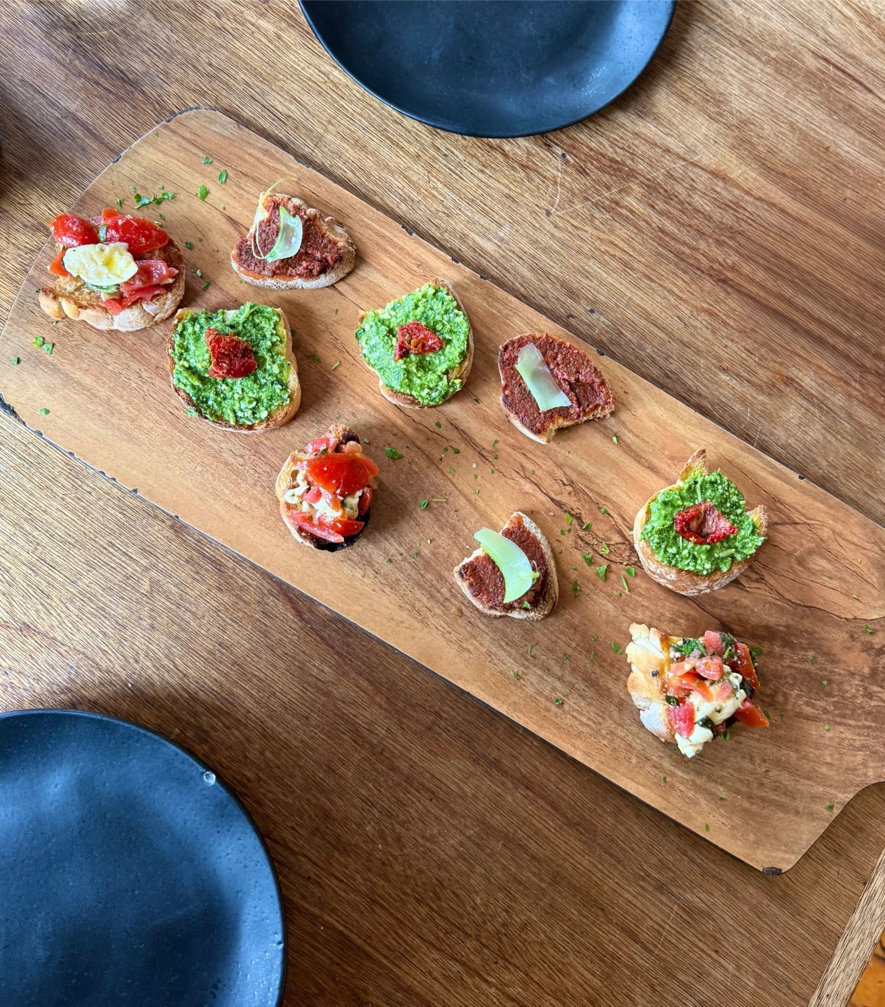Bruschetta starter with tomato, herbs and olive oil served at Woodlands Eatery in Cape Town