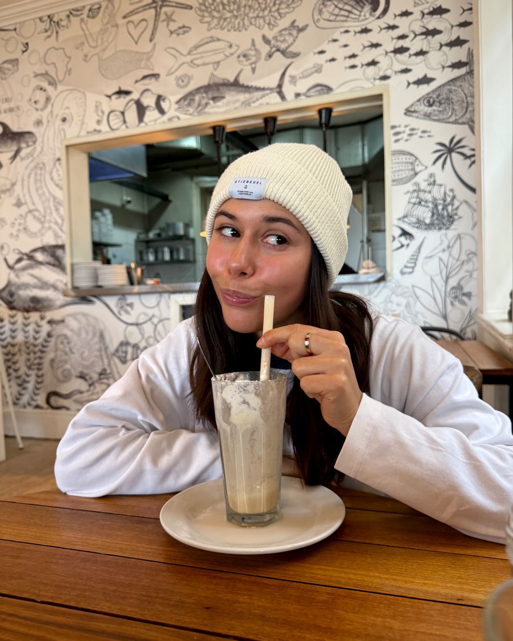 Paige enjoying a coffee milkshake at Dalebrook Café.