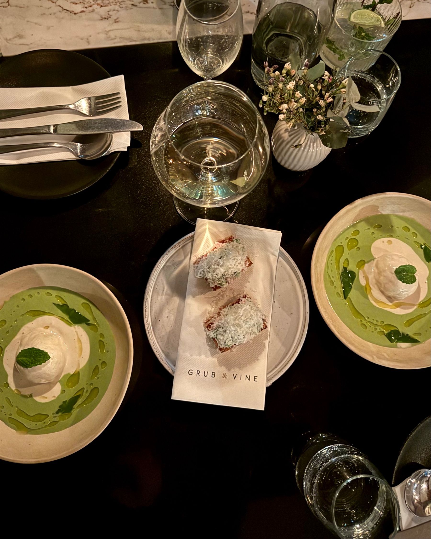 New-style salmon roses alongside other sushi dishes prepared by Chef JC at Aiko Sushi Plus.
