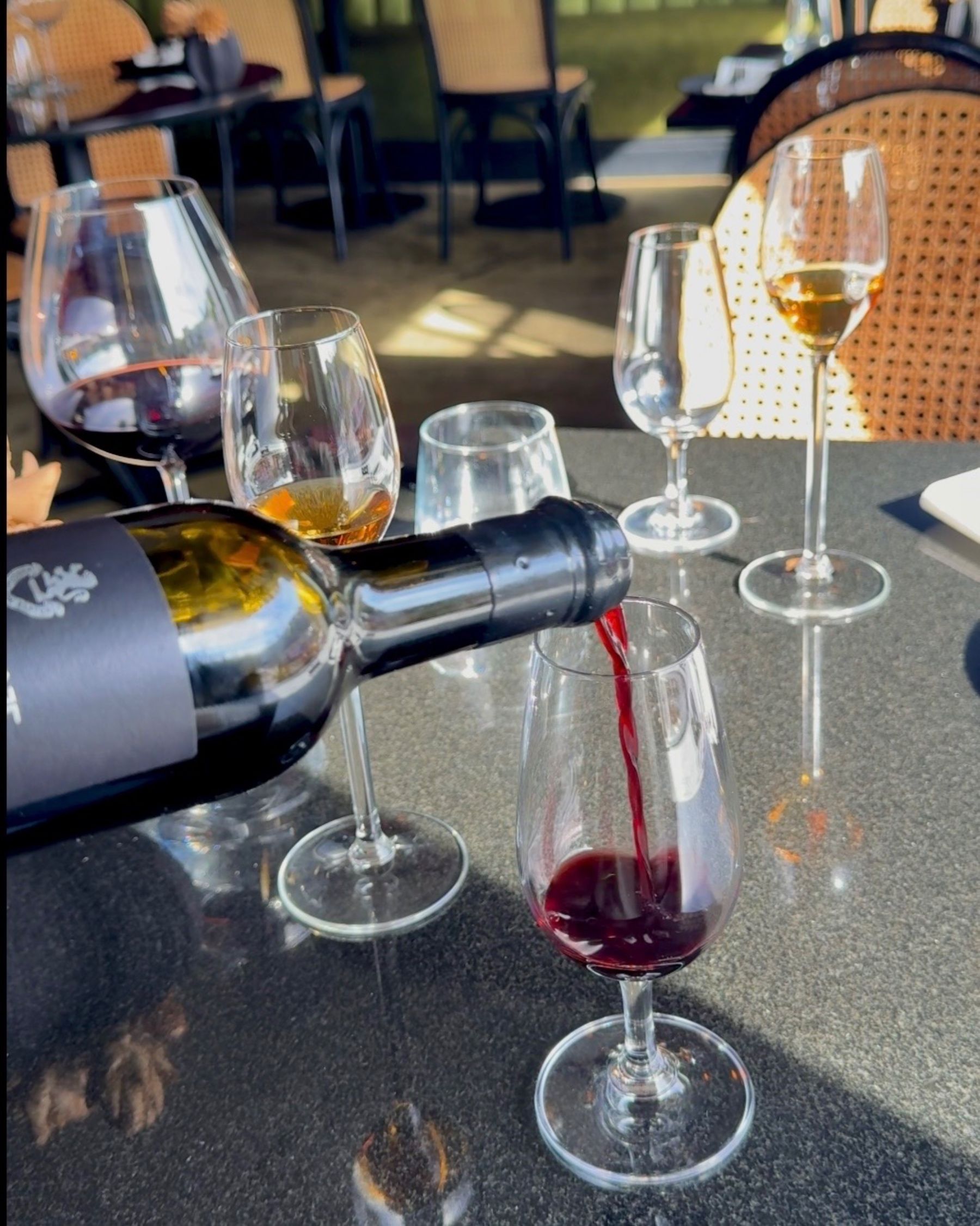 A second dessert wine being poured during the wine pairing.