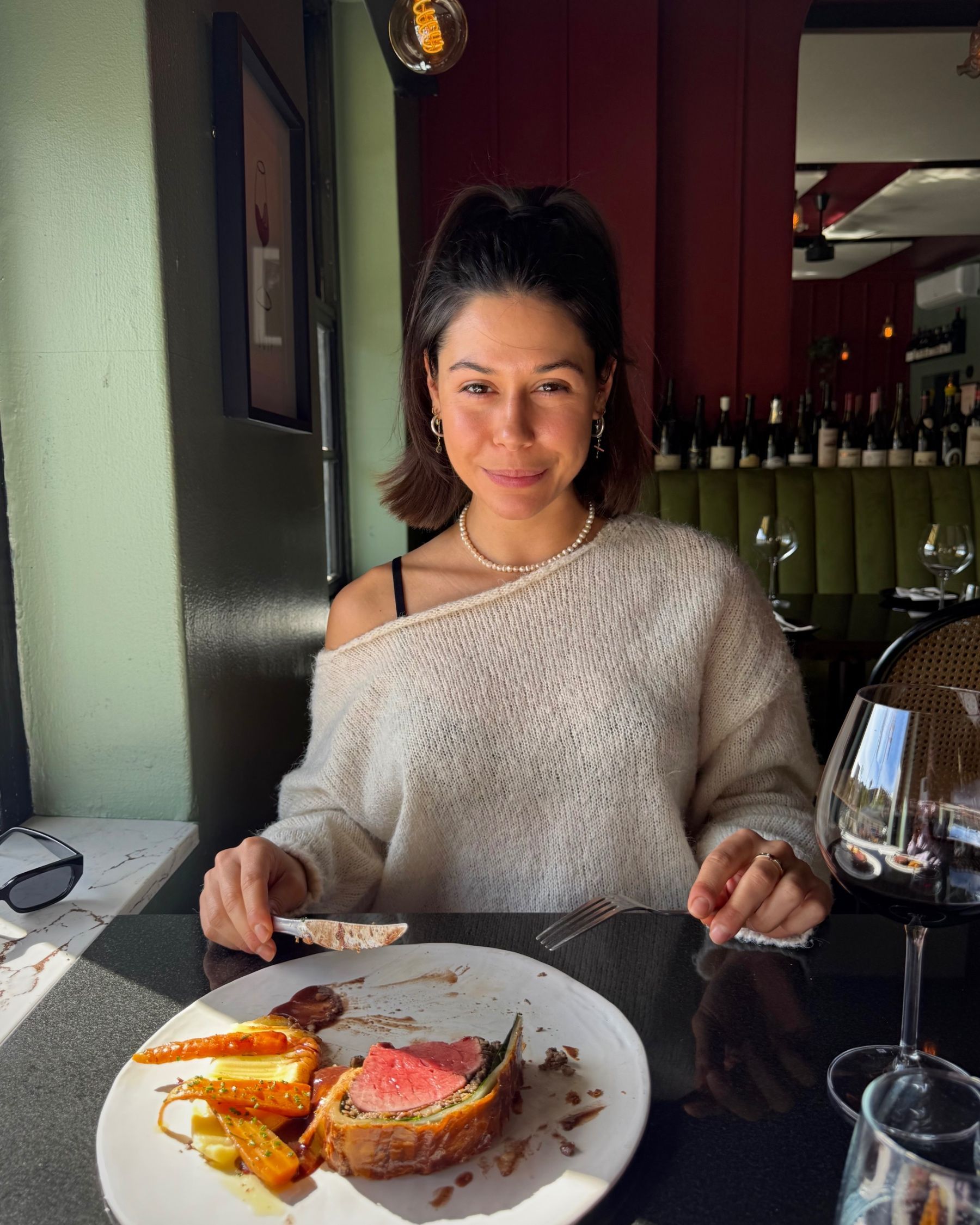 Paige enjoying the Beef Wellington.