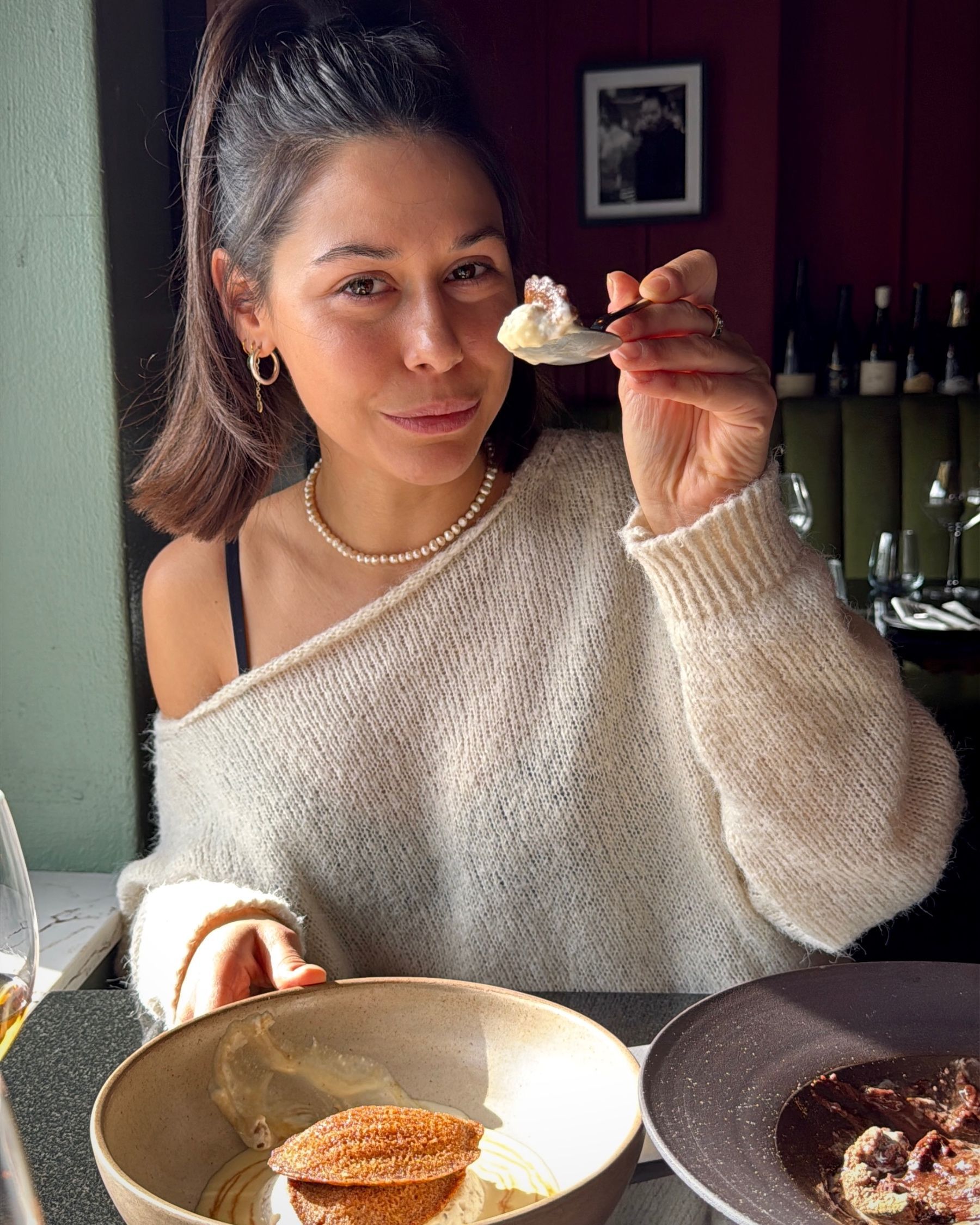 Paige enjoying the malva pudding madeleines.