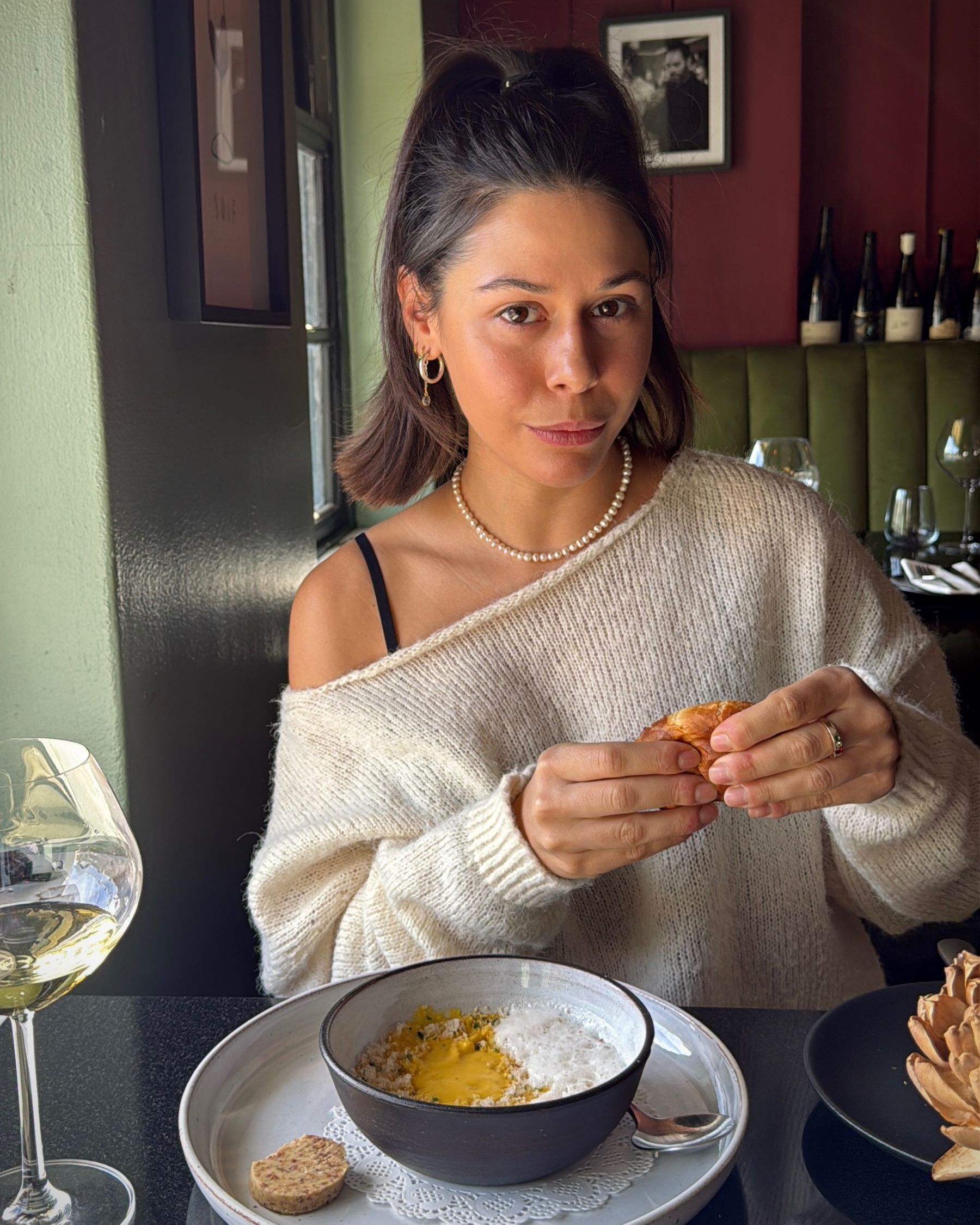 Paige enjoying the carrot and Parmesan soup.