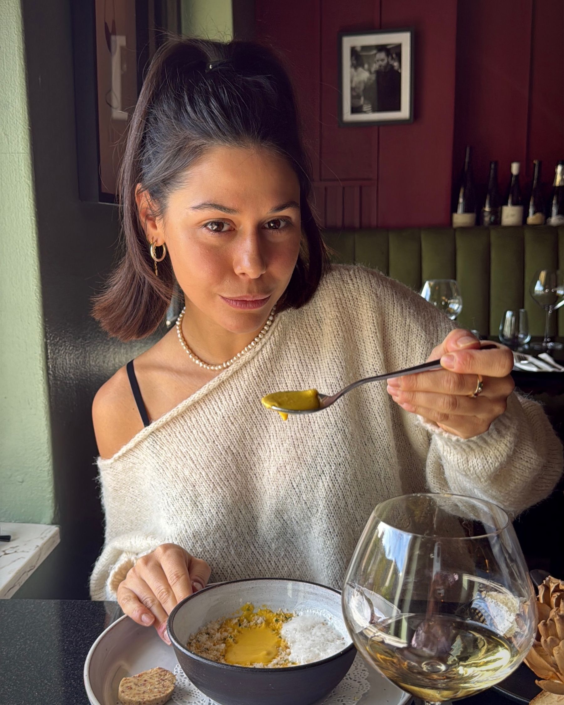 Paige enjoying another spoonful of carrot and Parmesan soup.