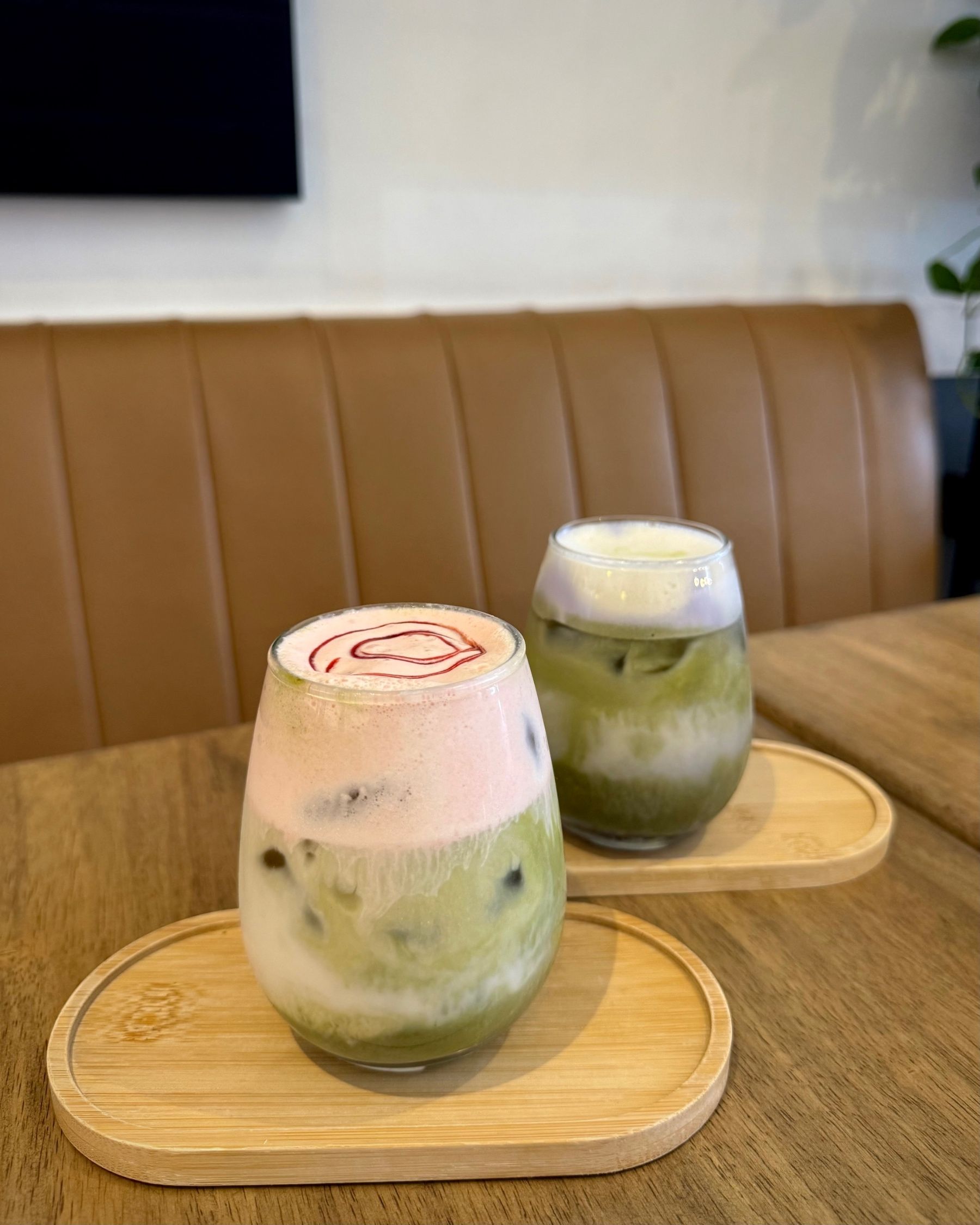 Close-up of Mischu’s Strawberry Cream Matcha and Butterfly Pea Matcha.