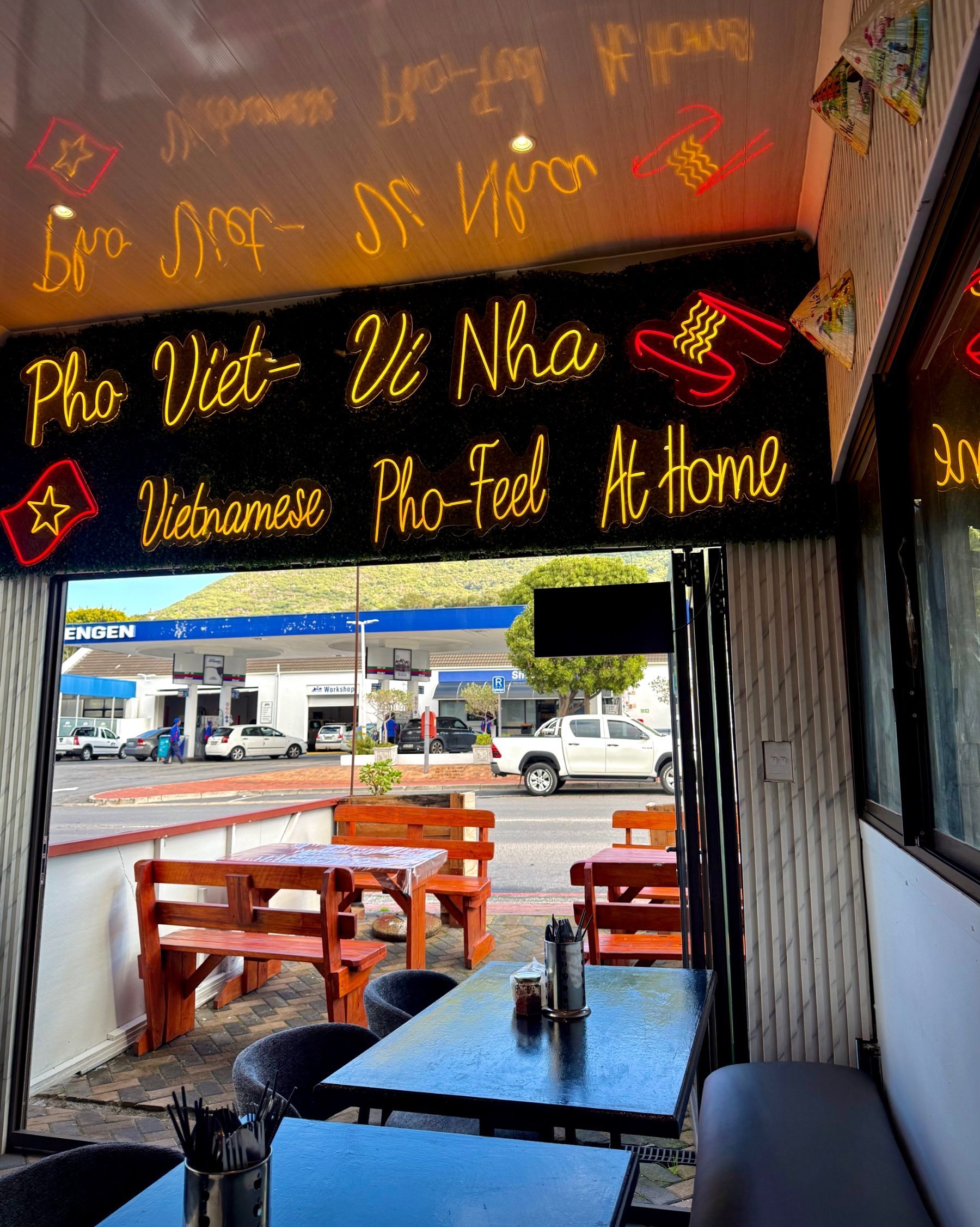 The warm and welcoming interior of Pho Hue Vietnamese restaurant in Hout Bay, Cape Town.