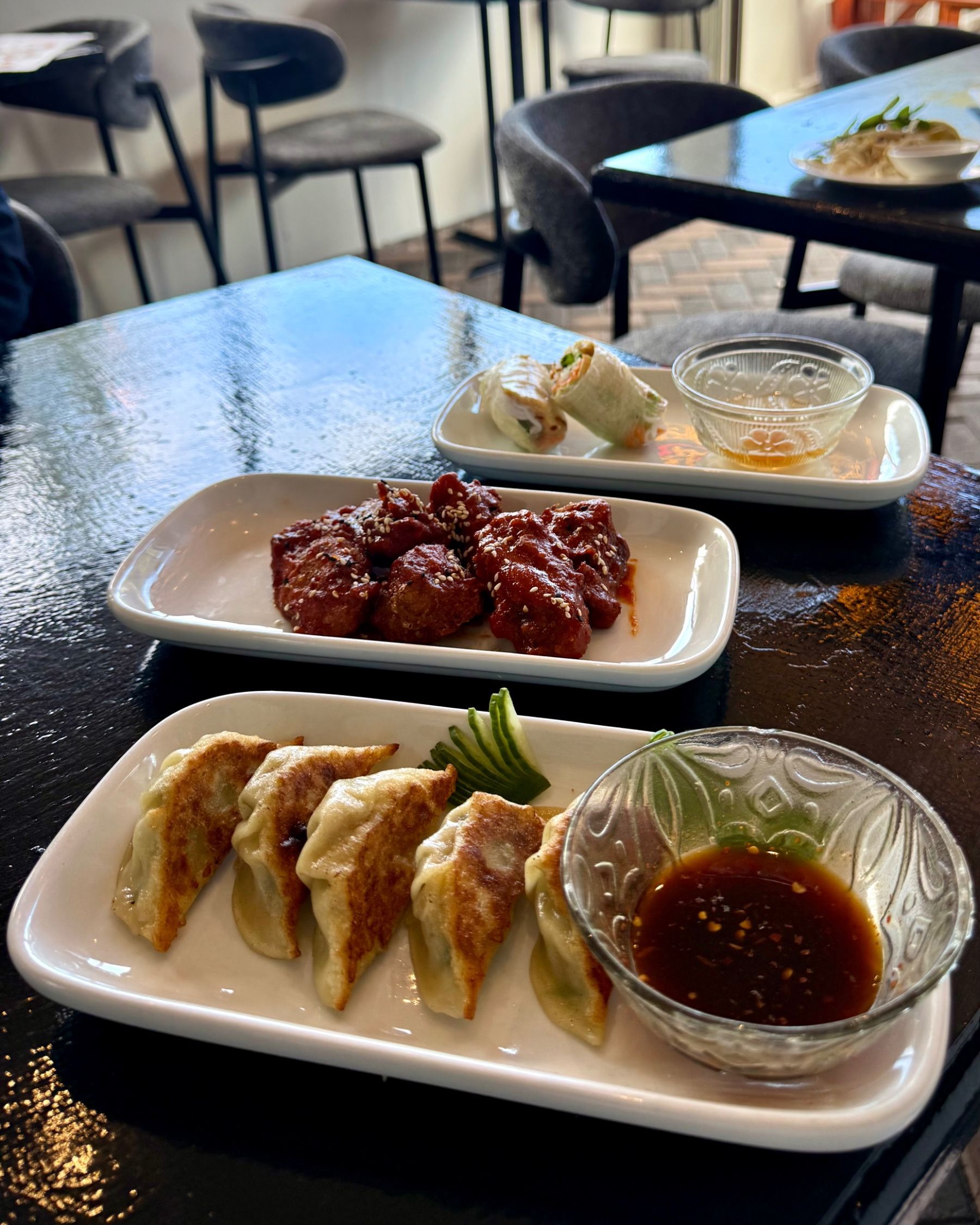 Chicken potstickers, fresh spring rolls and Korean fried chicken wings served at Pho Hue in Hout Bay.
