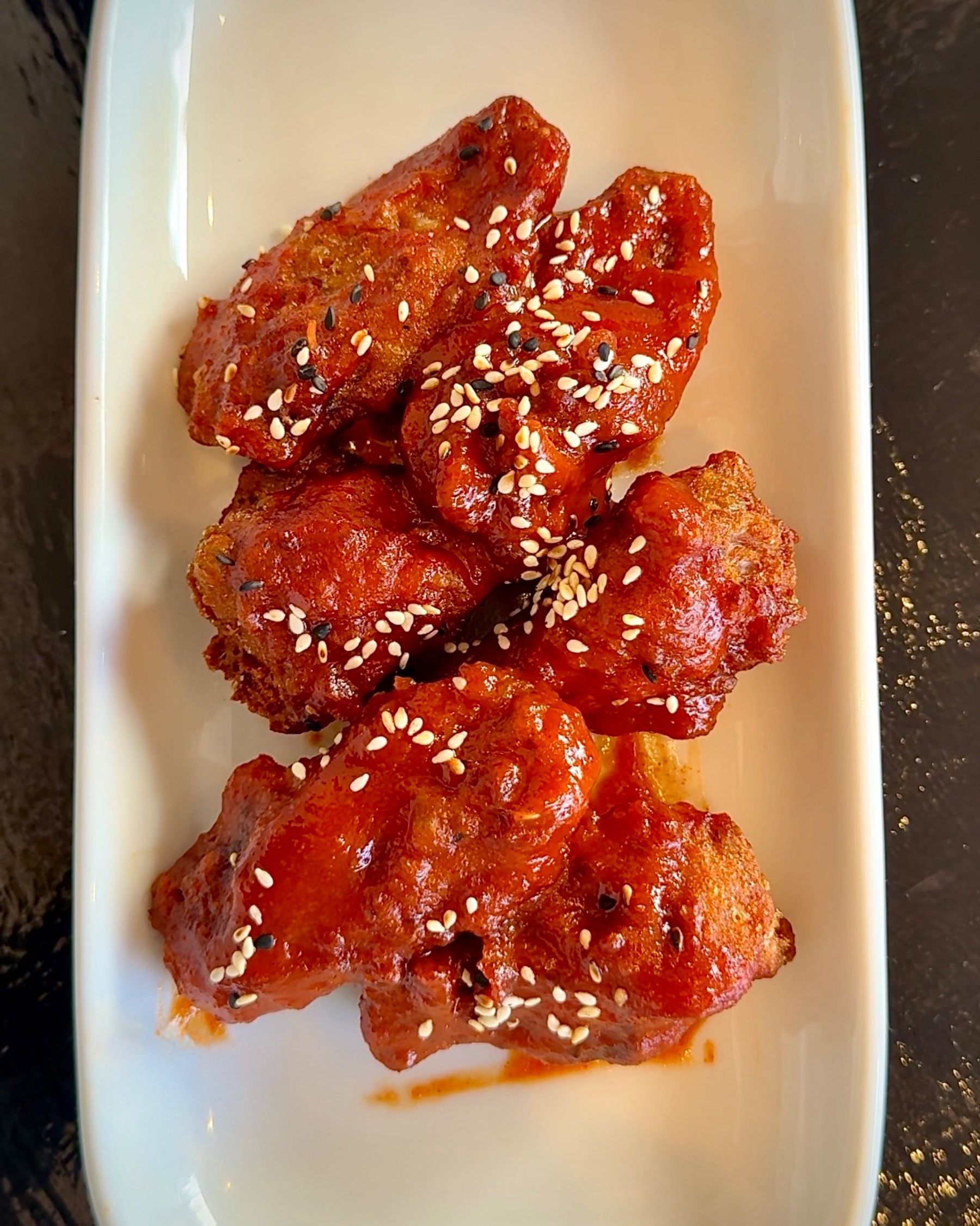 Sticky Korean fried chicken wings served at Pho Hue in Hout Bay.