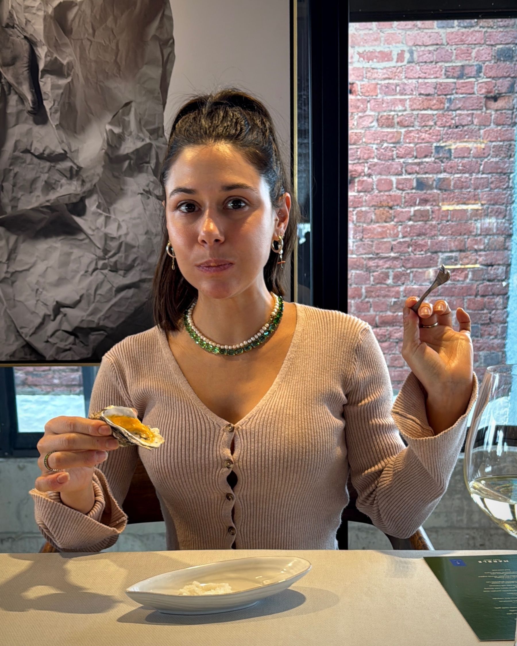 Paige tasting the bacon jam biscuit canapé.
