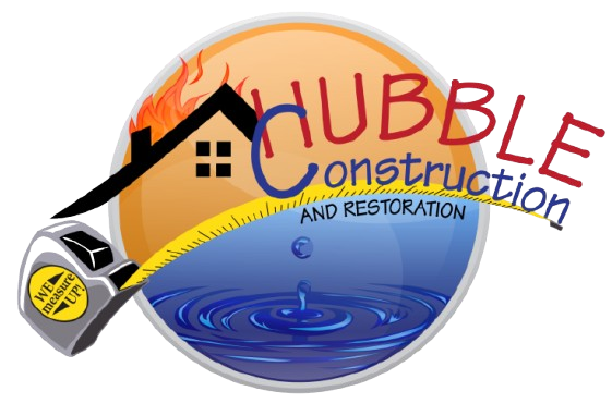 A logo for hubble construction and restoration with a tape measure
