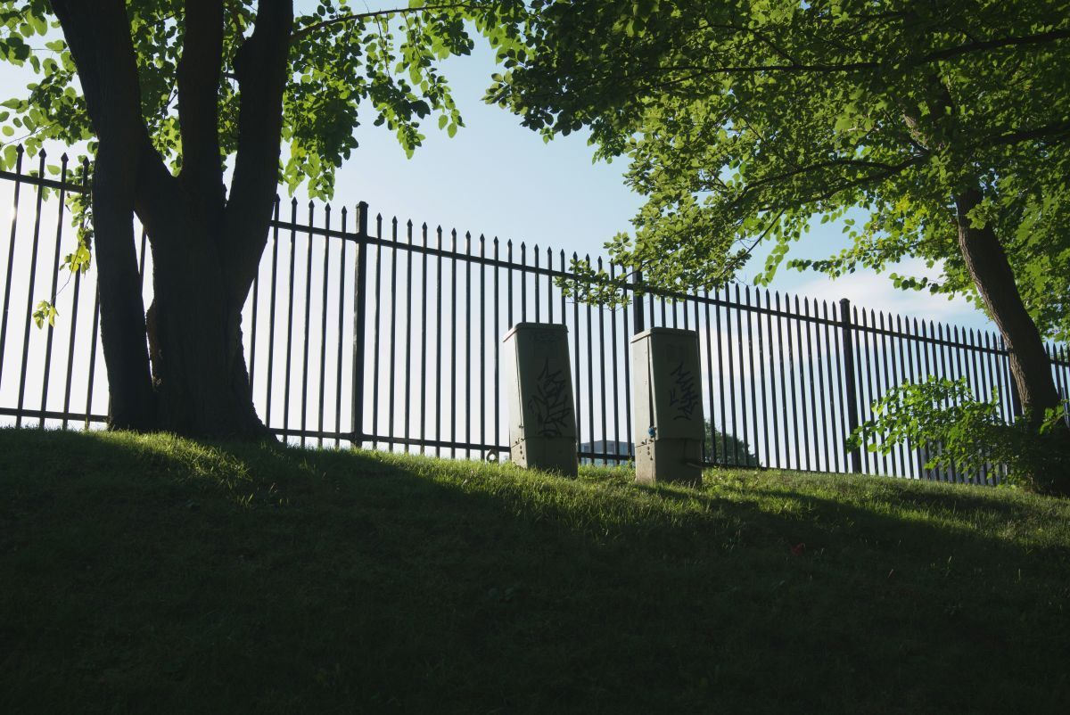 Fence installation for a residential backyard.