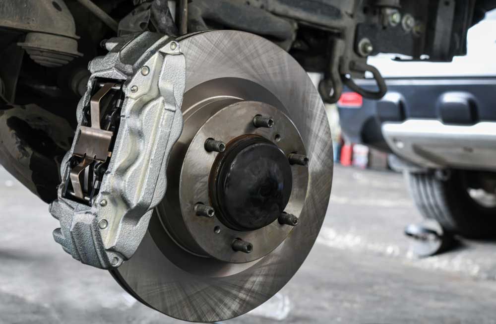 Closeup On The Brake System Of A Car — KBX Mechanical In West Mackay, QLD