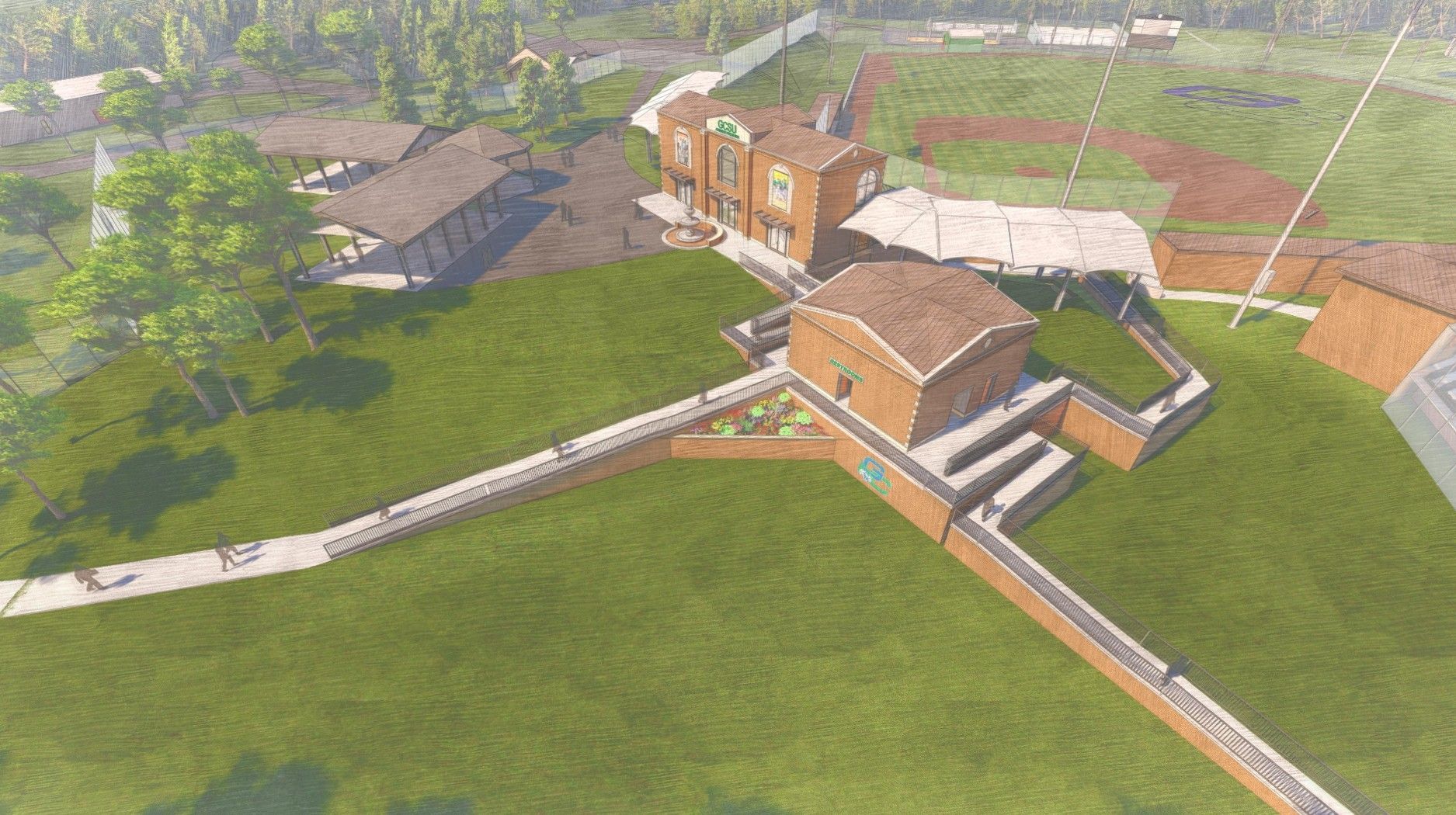 Aerial view of a campus with buildings, a baseball field, and green lawns; brown brick buildings stand out.