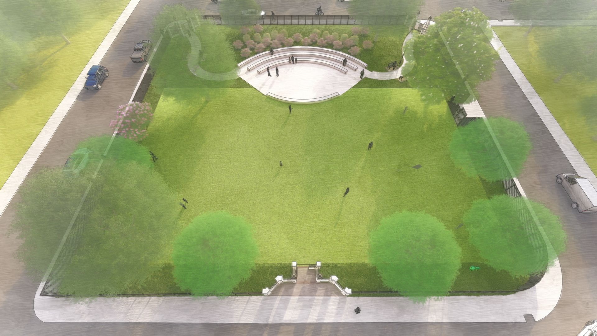 Aerial view of a green park with a stage, trees, and people.