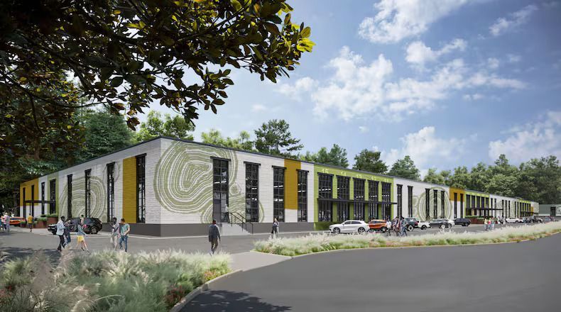 Exterior rendering of a modern, single-story building with colorful accents, people, and parked cars under a cloudy sky.