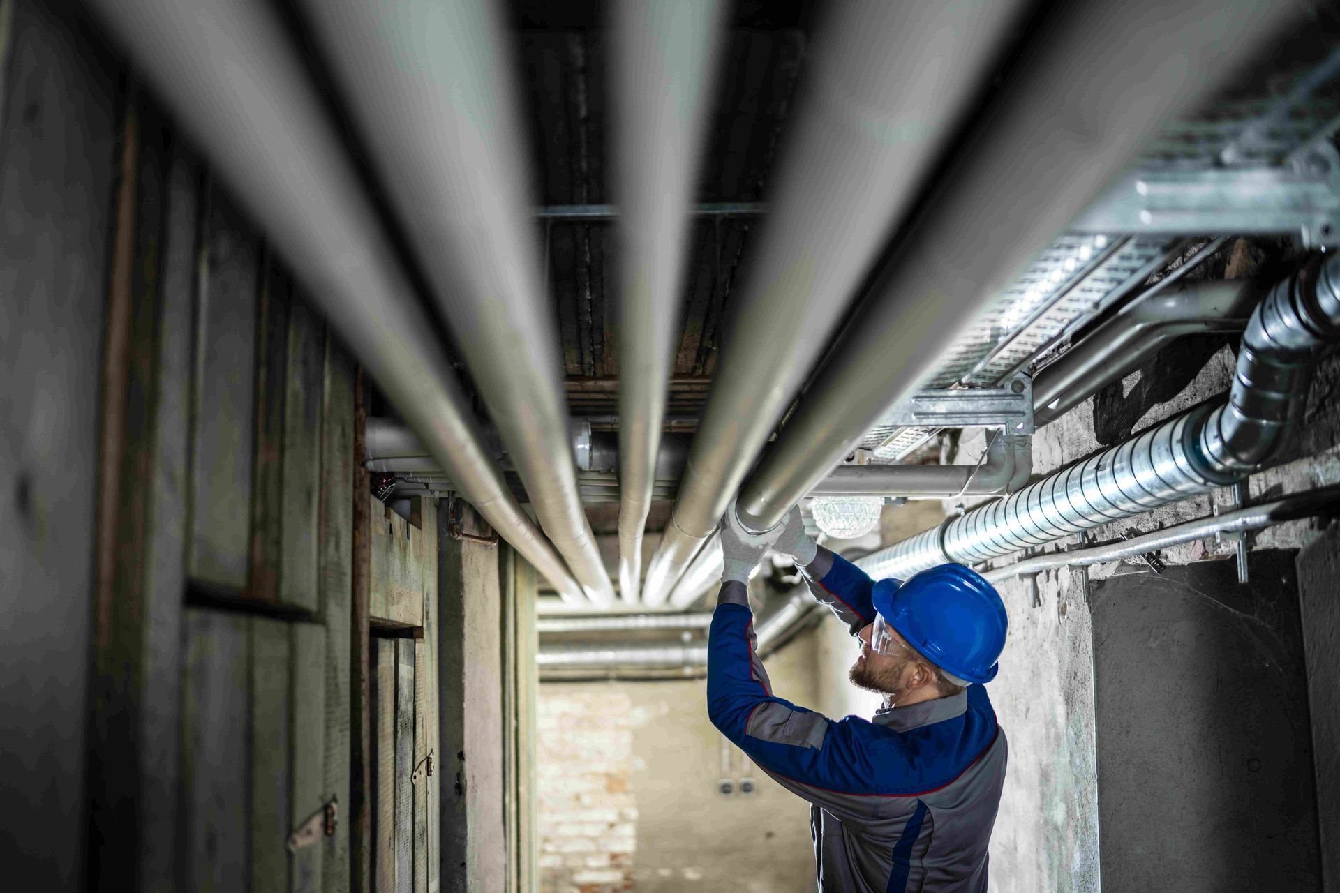 Plumber checking the pipes
