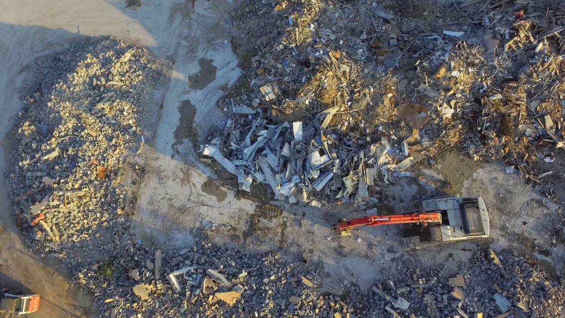 Aerial view of abandoned site demolition and hazardous debris cleanup for compliant environmental closure