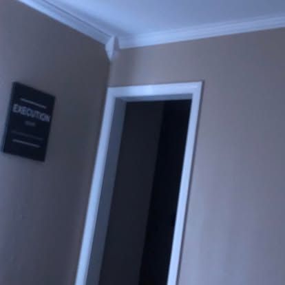 A black sign with the word 