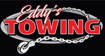 Eddy's Towing logo: red text over a black background, with a towing chain and hook.