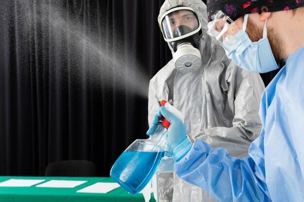 disinfection workers check whether spraying equipment various surfaces is working