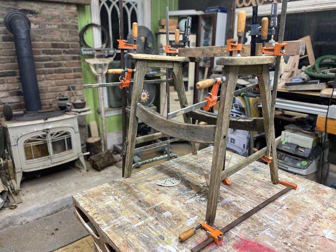 a wooden stool is being worked on in the cape island woodworks workshop