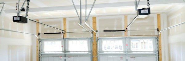 Garage ceiling with two automated