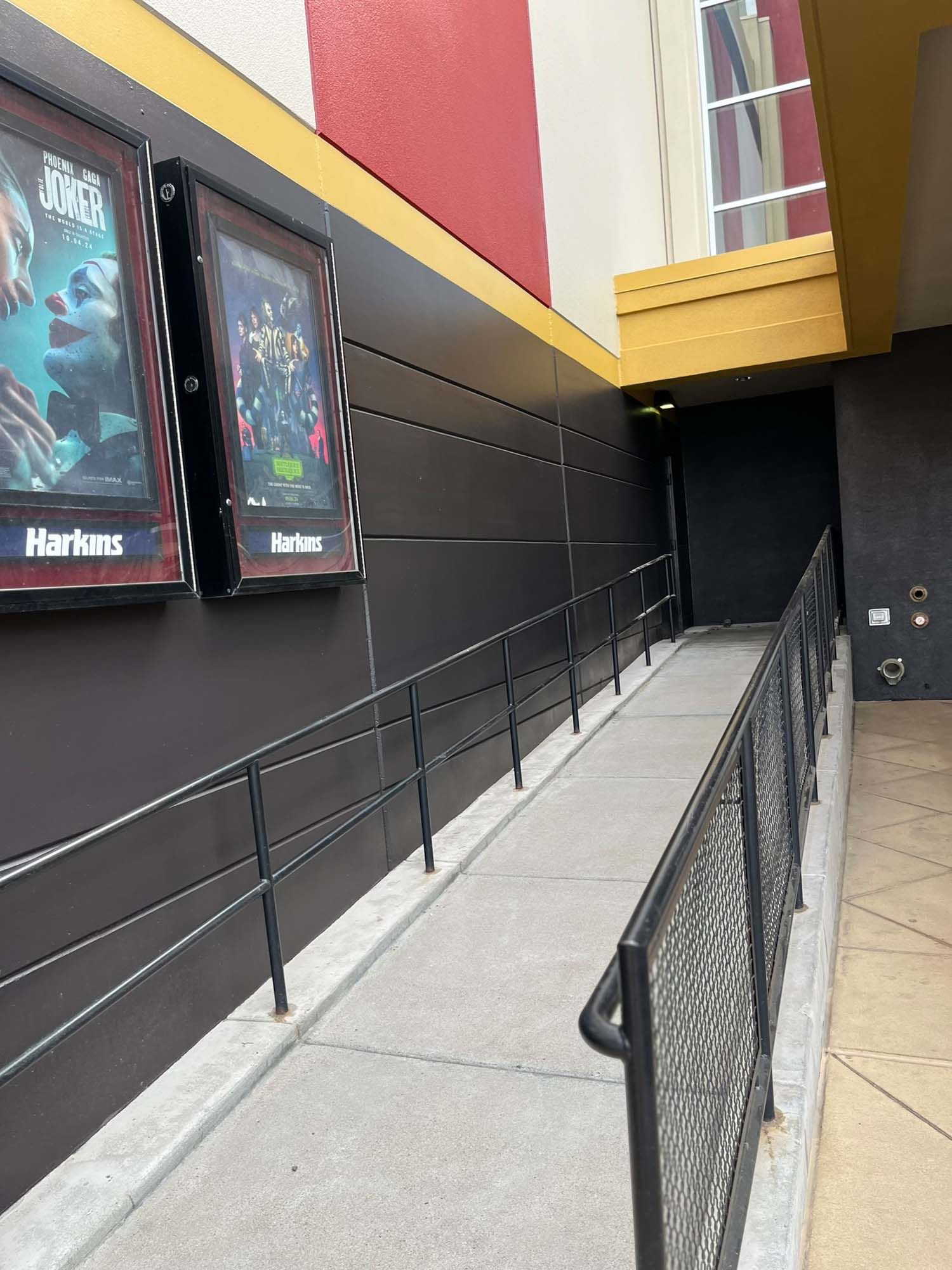 A ramp leading to the entrance of a movie theater