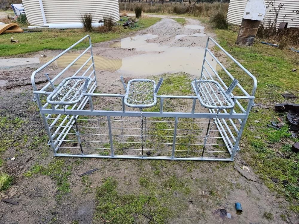 Metal Rack Frame on a Muddy Driveway in a Rural Yard — Dusty Rural Contracting in Coolac, NSW