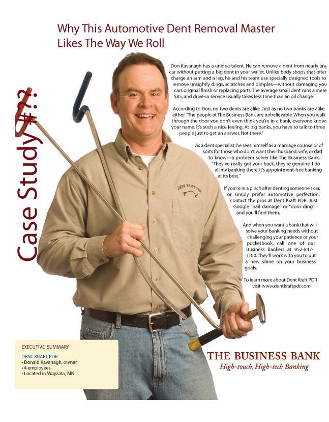A man is holding a golf club and a hammer in his hands.
