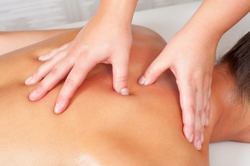A Person is Getting a Massage on Their Back — Life24 Health Bowen Therapy In Lavington, NSW
