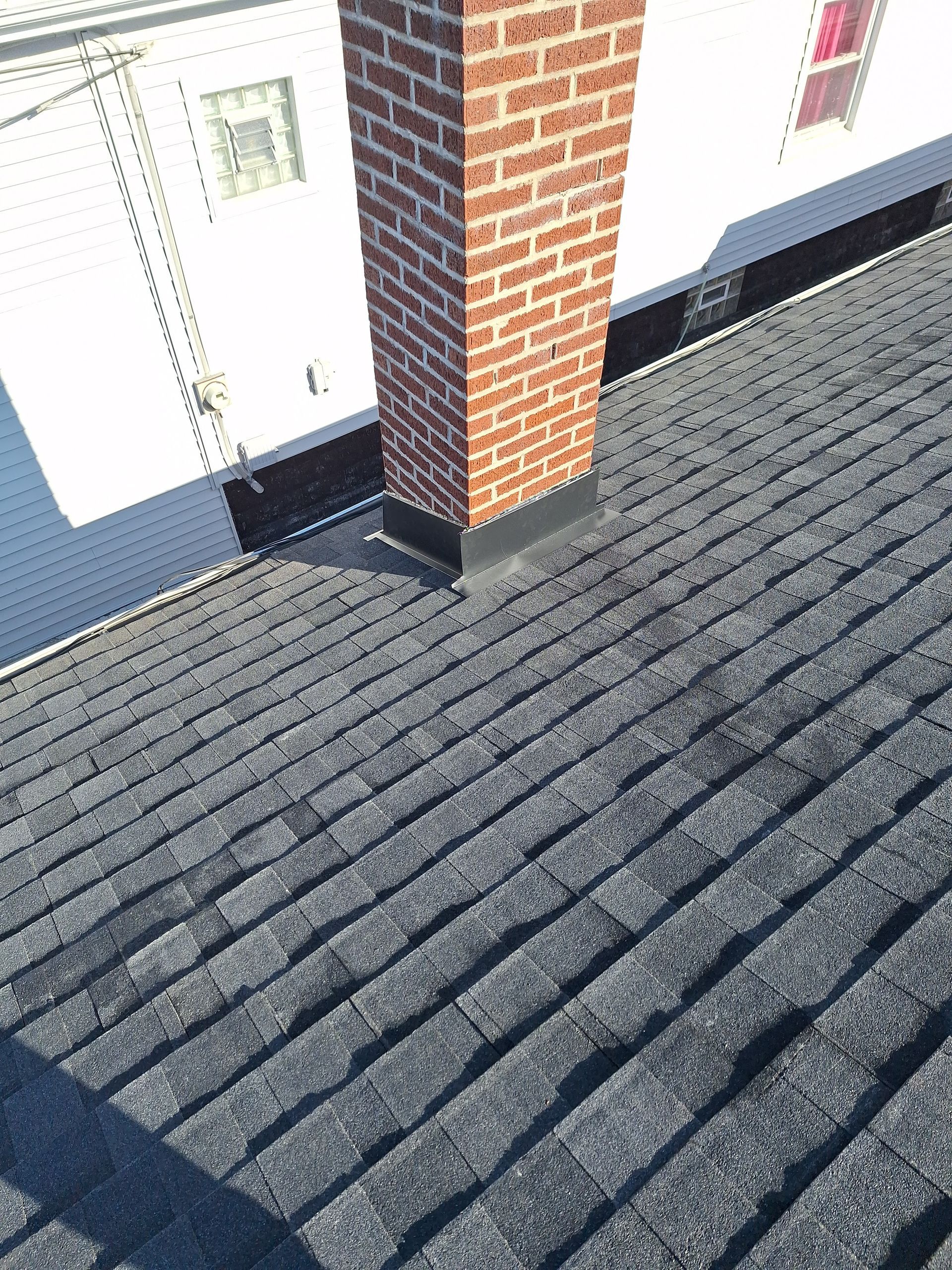 A roof with a chimney on top of it