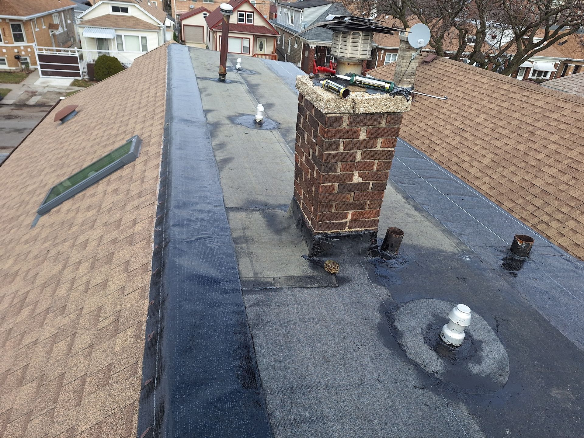 A roof with a chimney on top of it