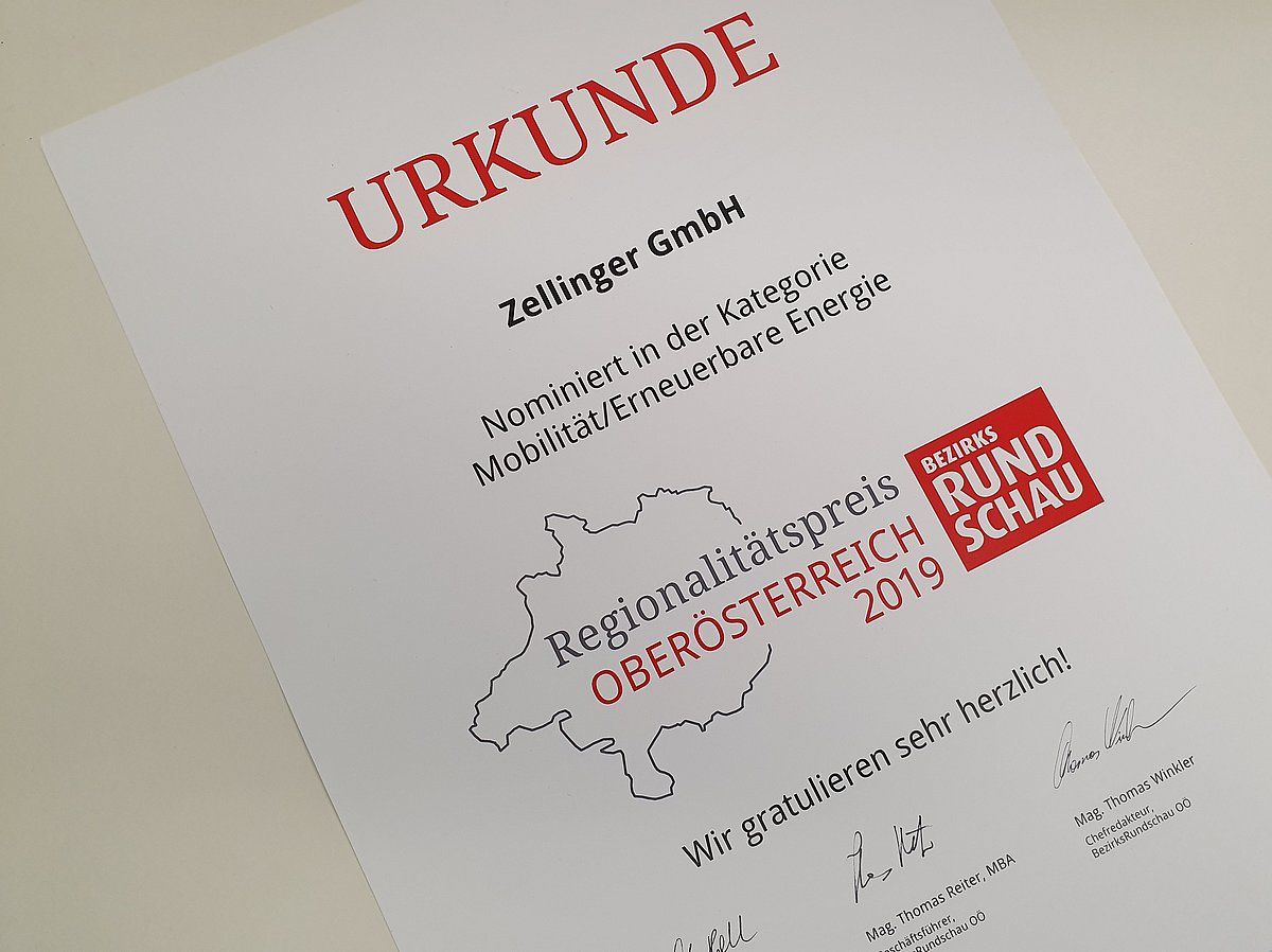 Certificate: Zellinger GmbH, Regionality Award Upper Austria 2019, red text on white, Austria map, signed.