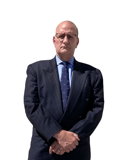 Attorney Tim Pori looking serious with hands clasped