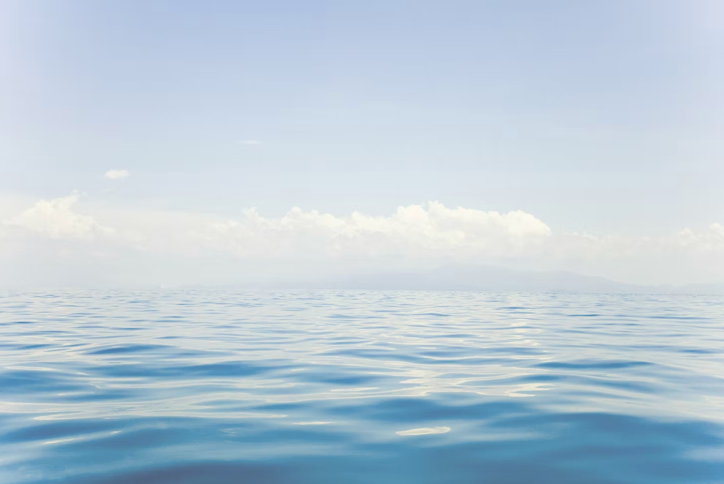 Ocean blue sky clouds